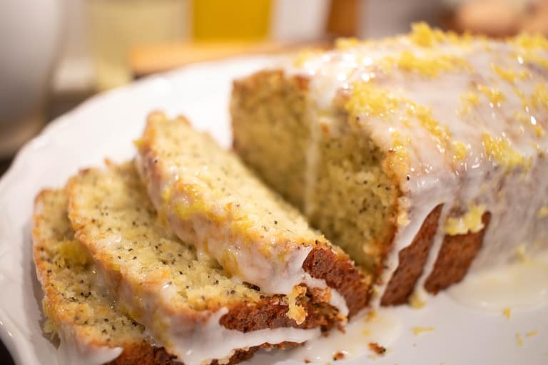sourdough lemon poppy seed poundcake cut into slices and layered on top of each other
