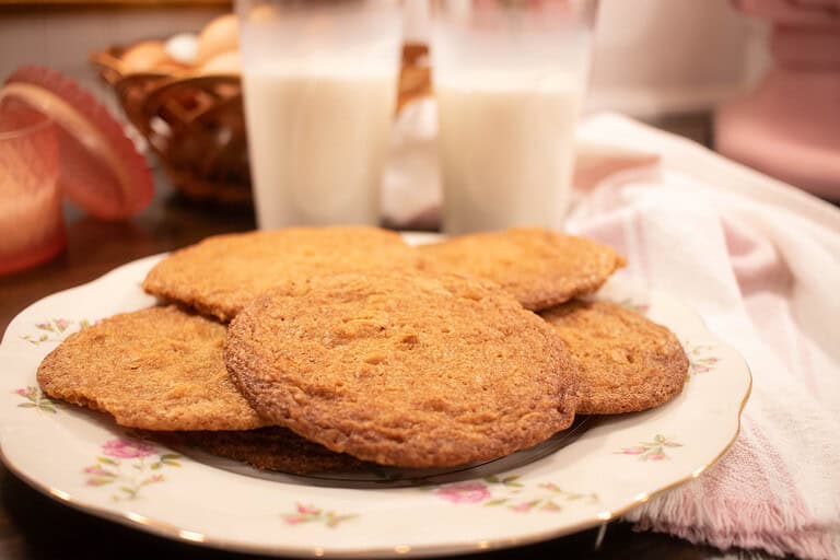 A plate of These Thin and Crispy Butterscotch Cookies are a family favorite for a reason! With the perfect balance of sweetness and crunch, they're a delightful homemade treat for any occasion.