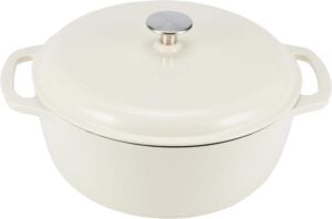 Cream Enamel Dutch Oven Cream-colored enameled cast iron Dutch oven, perfect for simmering peach preserves or small-batch cottage-style recipes.