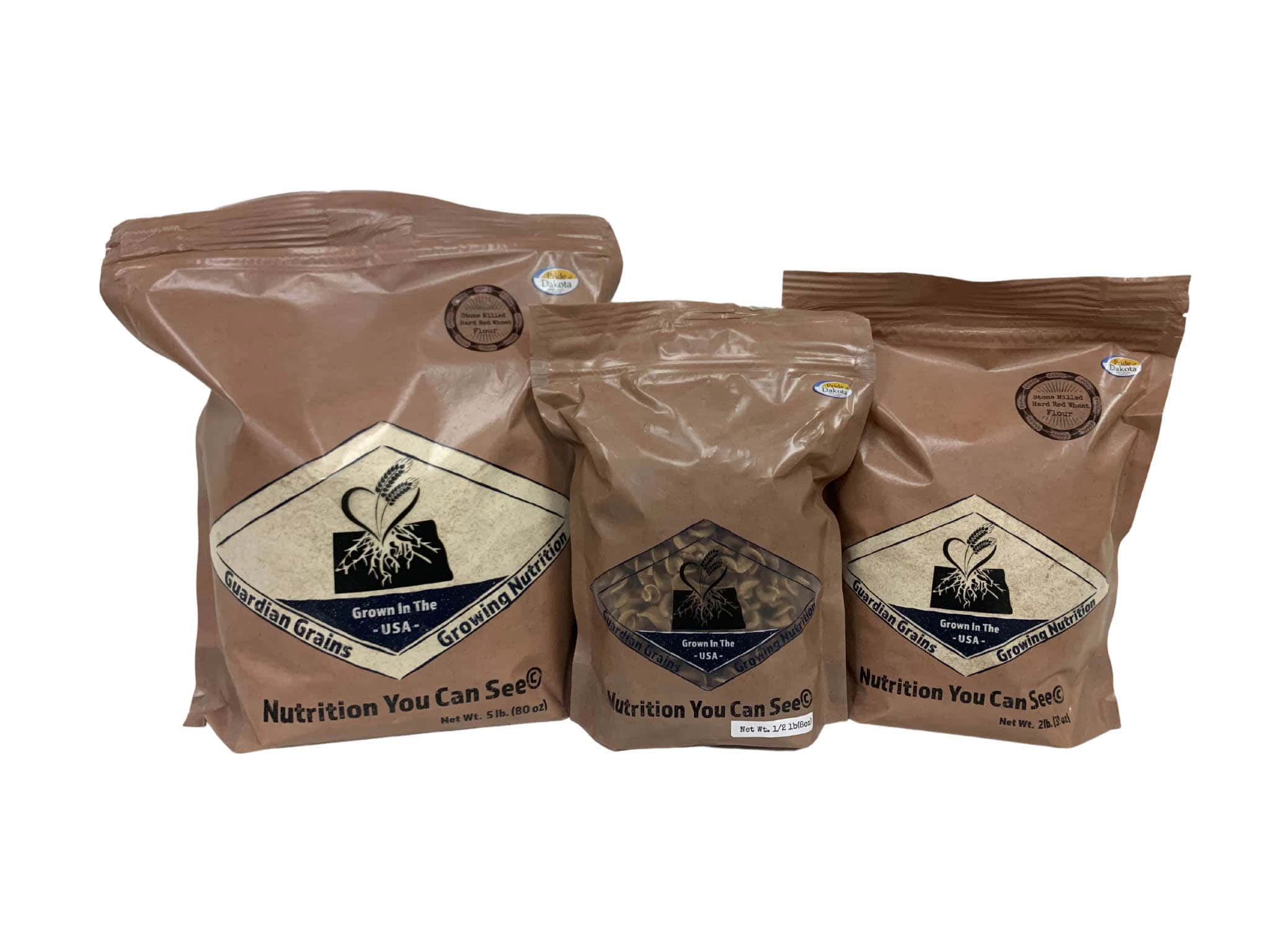Guardian Grains wheat berries packaged in clear brown vacuum-sealed bags labeled ‘Nutrition You Can See,’ featuring transparent windows and a clean white background — perfect for showcasing quality whole grains.