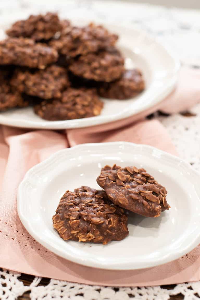 No-bake sourdough oatmeal chocolate cookies served on a small white plate with soft pink napkin