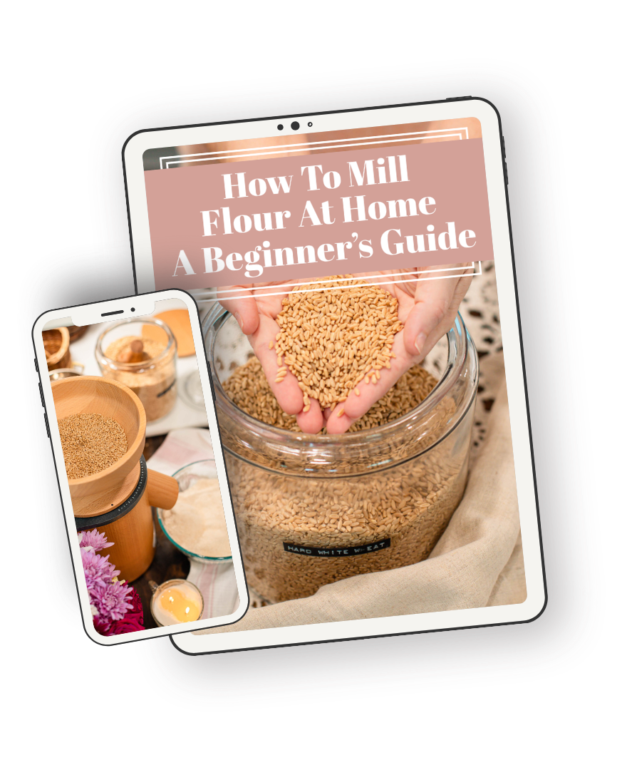 Tablet and phone mockup displaying “How to Mill Flour at Home: A Beginner’s Guide” with wheat berries and a grain mill.