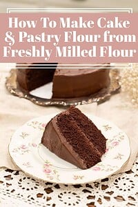 Pinterest-style graphic with text reading “How To Make Cake & Pastry Flour from Freshly Milled Flour” over a soft, cozy image of a slice of chocolate layer cake with chocolate frosting on a floral plate, with the full cake blurred in the background