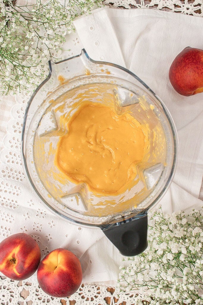 Brown butter custard Peach base blended smooth in a glass mixing bowl