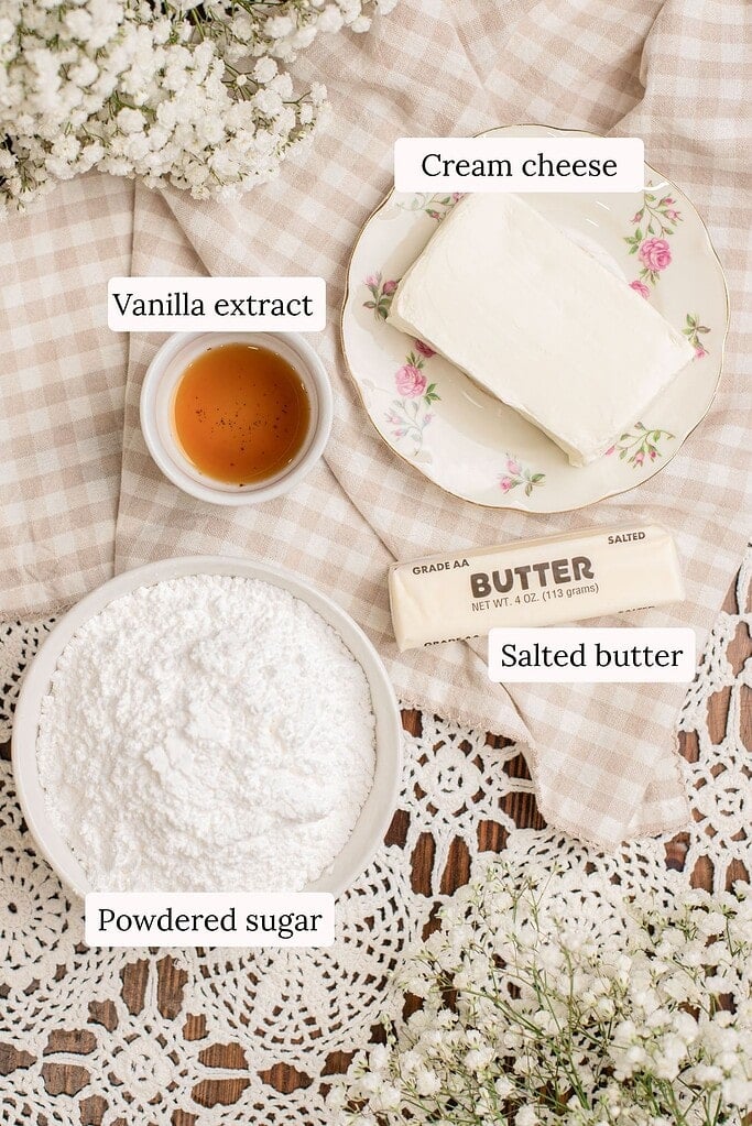 Cream cheese frosting ingredients for cinnamon rolls made with freshly milled flour, including cream cheese, salted butter, and powdered sugar